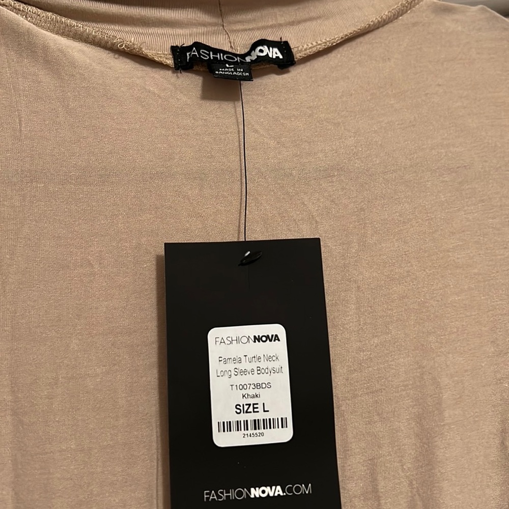 Brand new khaki colored turtle neck bodysuit